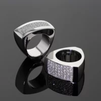 Large and chunky rings in polished white gold with diamonds