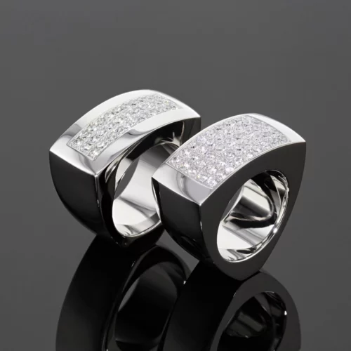 Large and chunky rings in polished white gold with diamonds