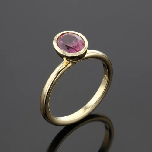 Delicate rose gold ring with an oval shaped Pink Tourmaline