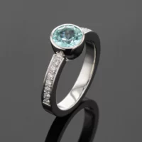 White gold ring with a Paraiba gemstone and diamonds