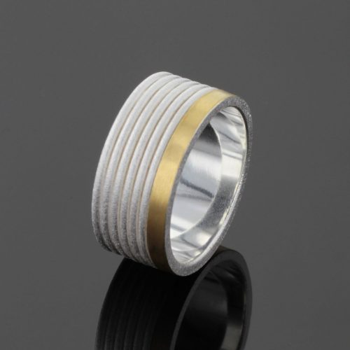 Silver ring with gold