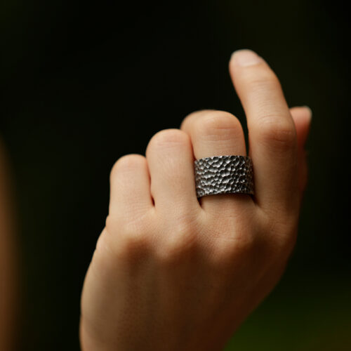 Wide rock textured ring in black silver