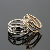Wire optic rings in rose and white gold with diamonds