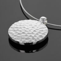 XL pendant in silver with rock texture
