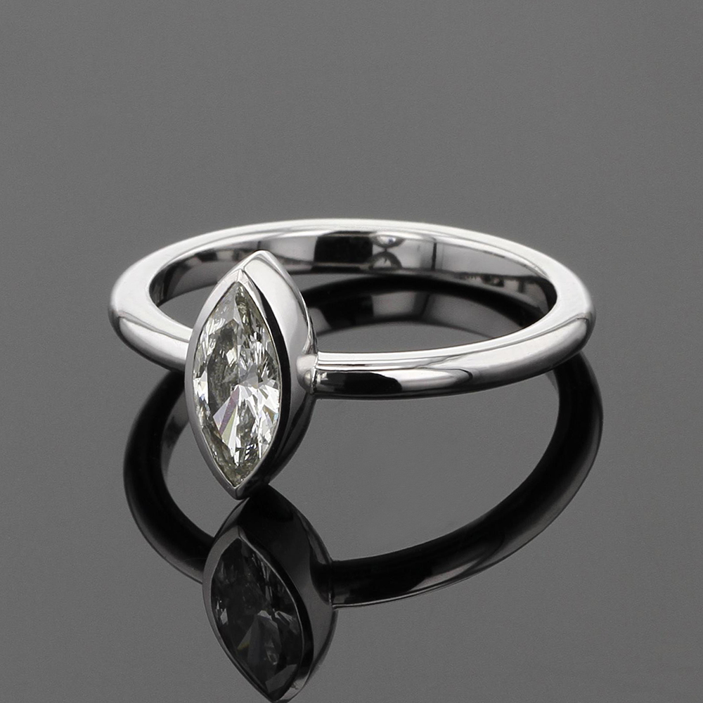 White gold ring with a marquise shaped diamond