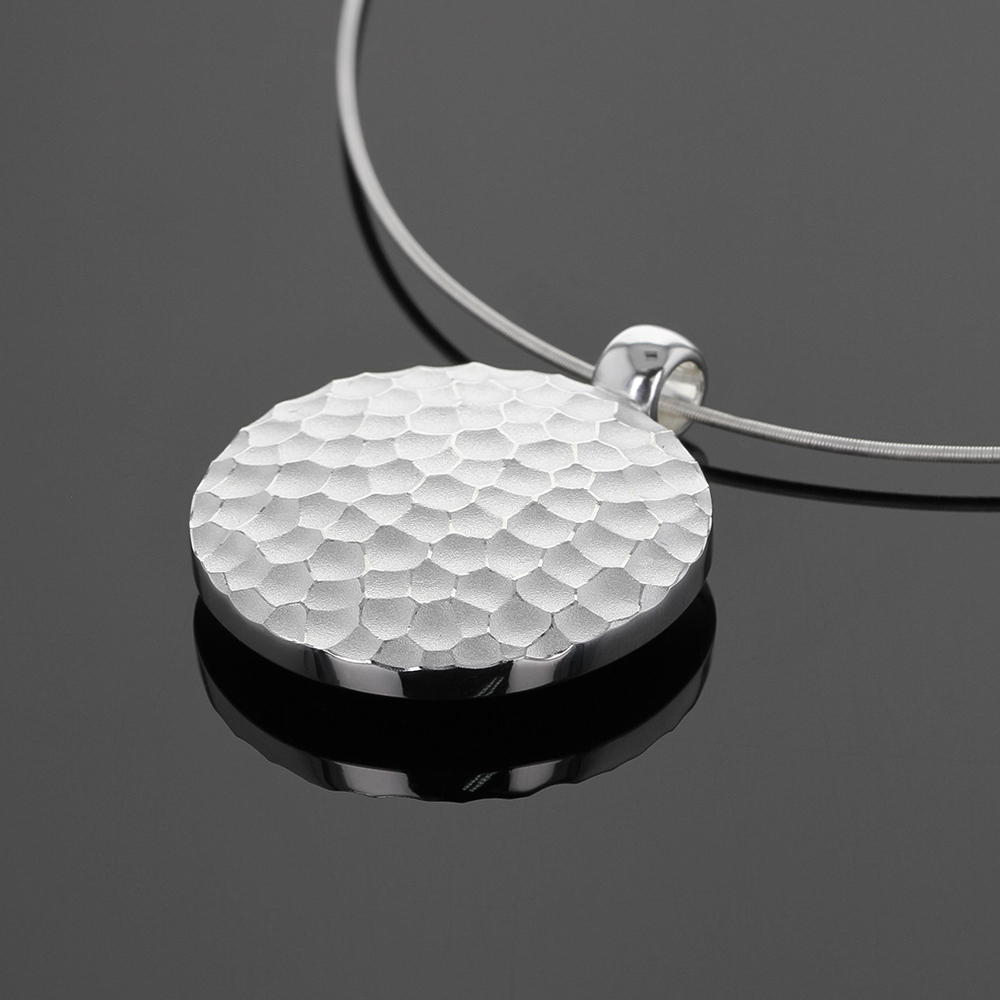 Pendant in silver with rock texture