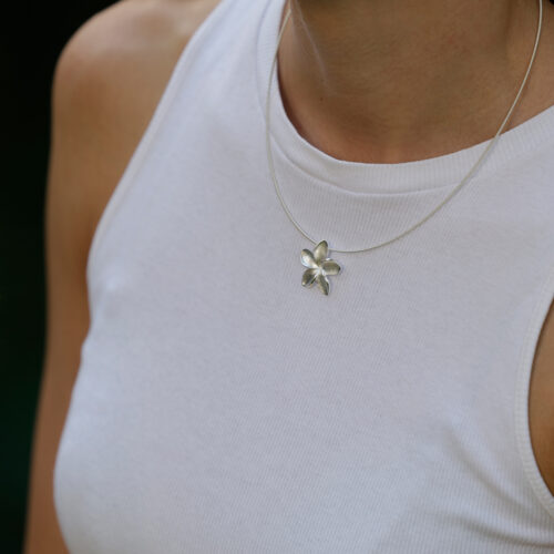 Frangipani flower pendant in silver