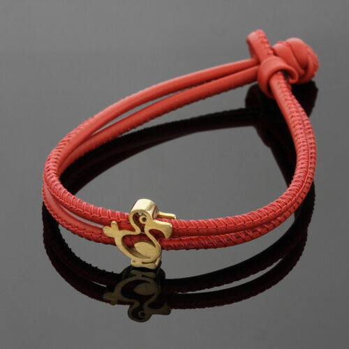 18ct yellow gold dodo on a leather bracelet