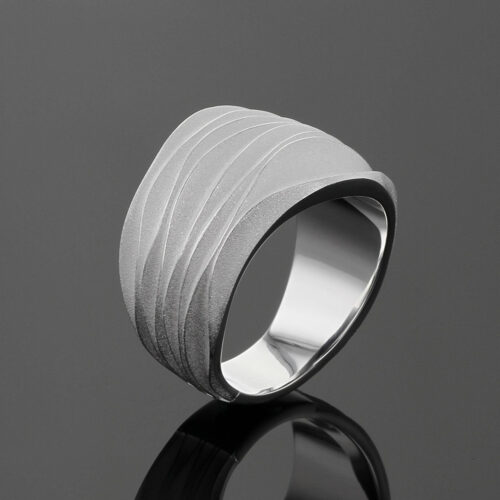 Sterling silver ring with organic wave textures