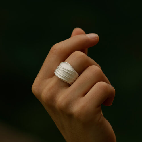 Sterling silver ring with organic wave textures