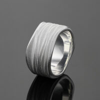 Sterling silver ring with organic wave textures