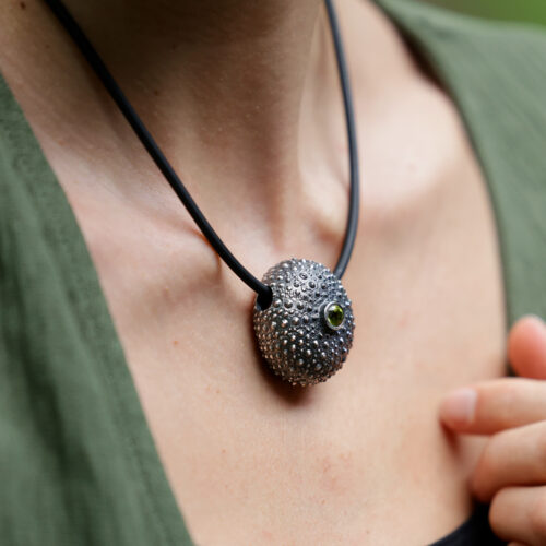 Large sea urchin pendant in oxidised sterling silver with a Peridot gemstone