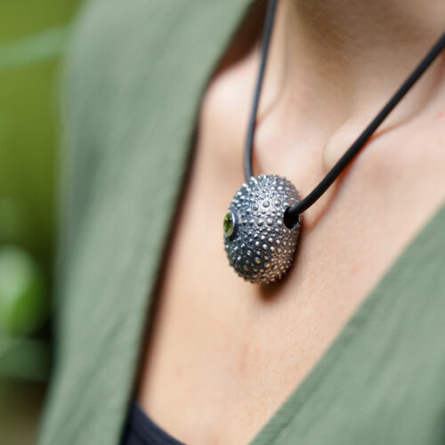 Large sea urchin pendant in oxidised sterling silver with a Peridot gemstone