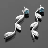 Long dangling earrings in silver with a Blue Topas