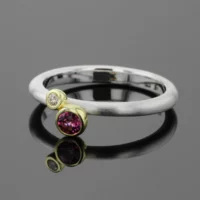 Silver, gold, diamond and Rhodolite ring